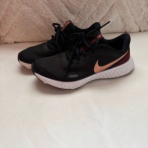 Black Nike running shoes